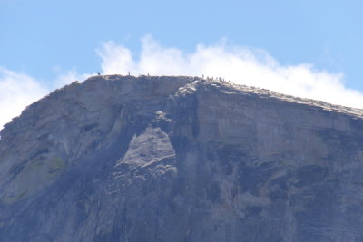 Hiker at top of Half Dome 