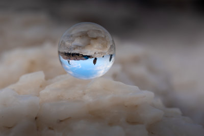 Glass ball reflection on Salt rock