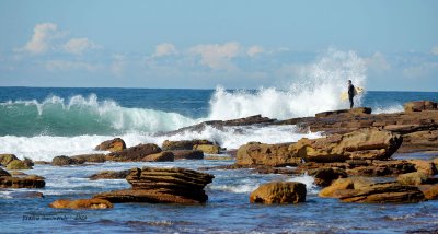 I recently went on a walk to 
Little Beach.
It was my first bushwalk after surgery.  
Once there I spotted this surfer waiting for the right moment to jump off the rocks.  
