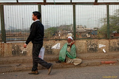 BLIND MAN BEGGING