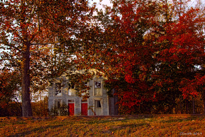 HOUSE SURROUNDED BY RED
