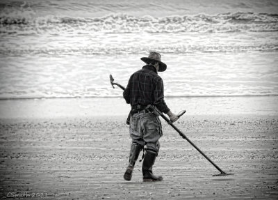 SEARCHING FOR BEACH TREASURE