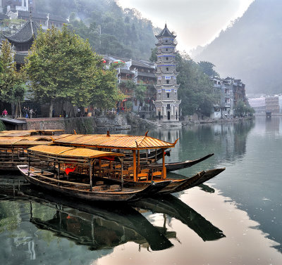Water taxis & pagoda in the mist
