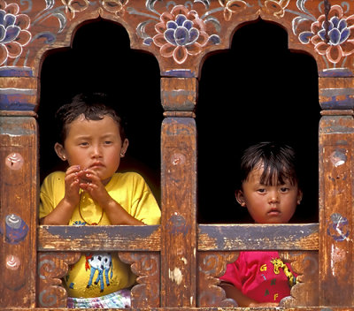 Children in a Colorful Window