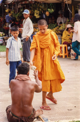 Monk Helps-Out Handicapped Man