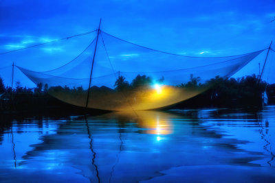 Fishing Net Suspended on Thu Bon River in Hoi An.