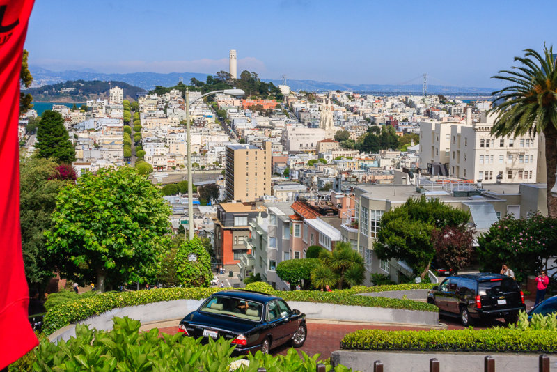 Lombard Street With Coit Tower In Distance