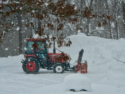 The Kubota has a front facing snowblower - so much easier on one's back!!