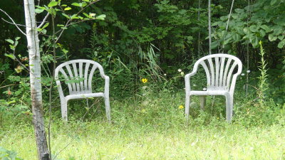 Chairs set at the top of pine hill ... a place to rest after walking the trail that follows the creek
