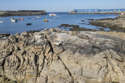 Harbour and painted sea wall at Baiona