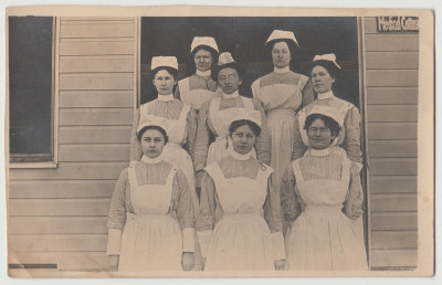 Sabina (Beba) with nurses, back row left