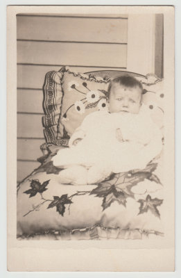 unknown baby on pillows