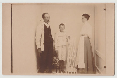 Unknown man, woman and young boy