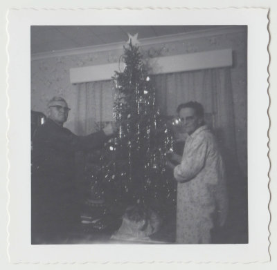 John and Clara Oberg with Christmas tree 1961?