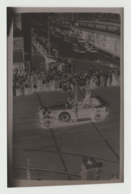 Negative image of parade, downtown DSM, Welcome to Des Moines GAR (Grand Army of the Republic?)