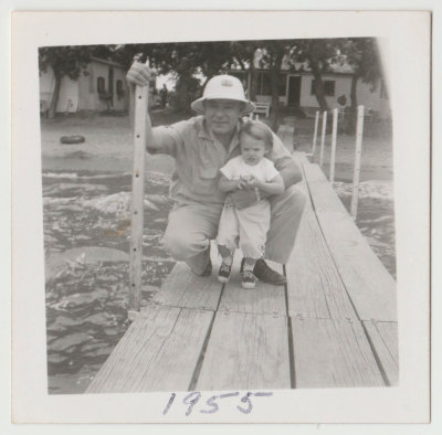 Harold Van Fleet and Karen? on lake dock, 1955