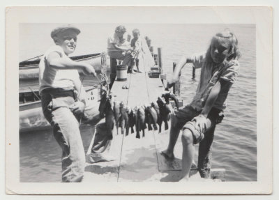 Bob and Kay Van Fleet fishing, Katherine, Chuck and Davey in background, 1944