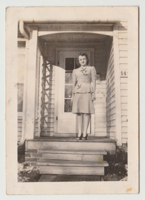 Helen Oberg on Oberg's front porch, Dec 13, 1942