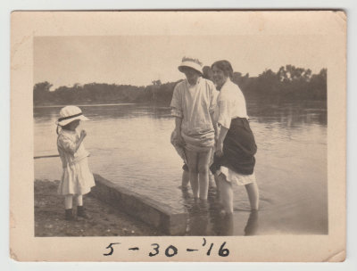 Women wading and young girl, May 30 1916