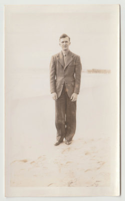Unknown young man in suit