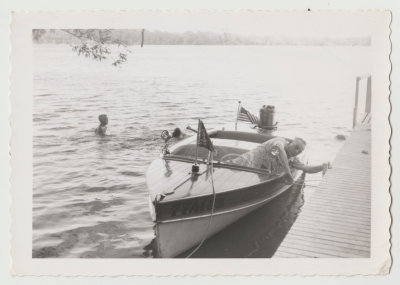 Harold Van Fleet in boat on spirit lake