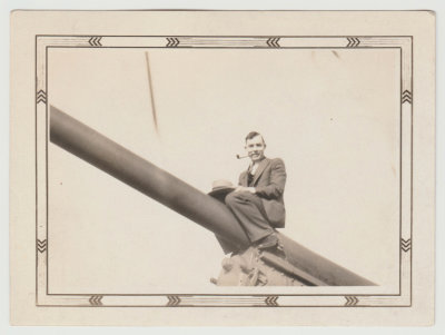 Harold Van Fleet sitting on canon at Iowa capitol