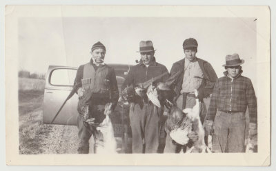 Harold Van Fleet and three friends pheasant hunting