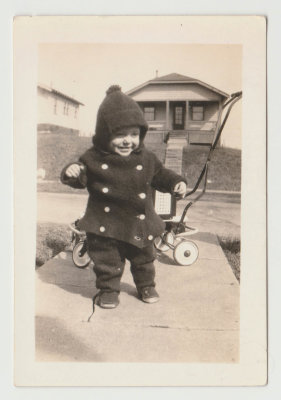 Kay Van Fleet ? toddler with stroller