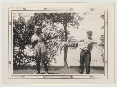 Harold Van Fleet and Dave Oberg with string of fish