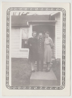 Molly Oberg, Dave Oberg, Beba Anderson in front of Oberg house, Jan 1944