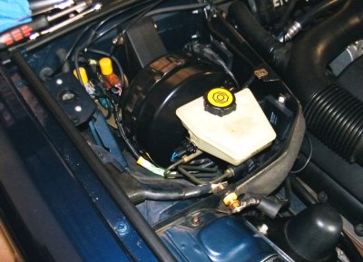 Location of the main power lead coming from boot/trunk to bus link for the starter lead