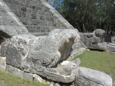 Serpent heads at the base of the stairway