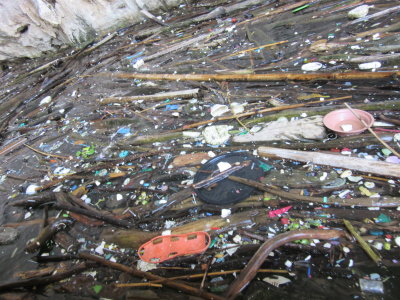 Plastic rubbish pools in the cave - what a shame