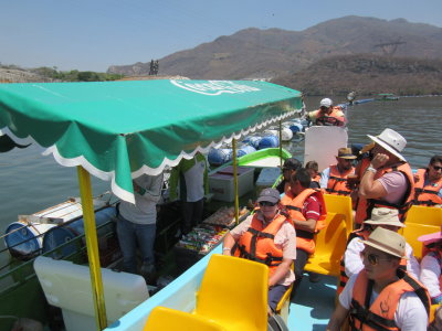 A drinks and snacks boat at the dam