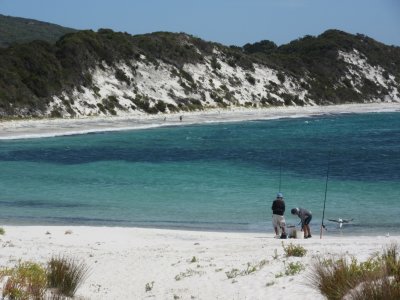 Two men enjoying a spot of fishing but the bird got there first!