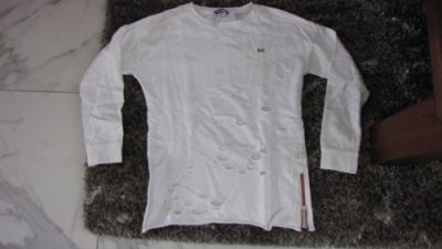 152 NIK & NIK gaten shirt wit 15,00*
