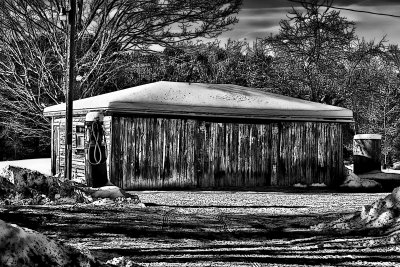 Gas pump and garage black and white.jpg