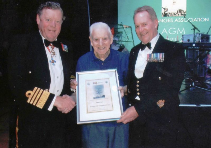 1943 - JOHN WATTS, RECEIVING A SPECIAL CERTIFICATE FROM THE PRESIDENT..jpg