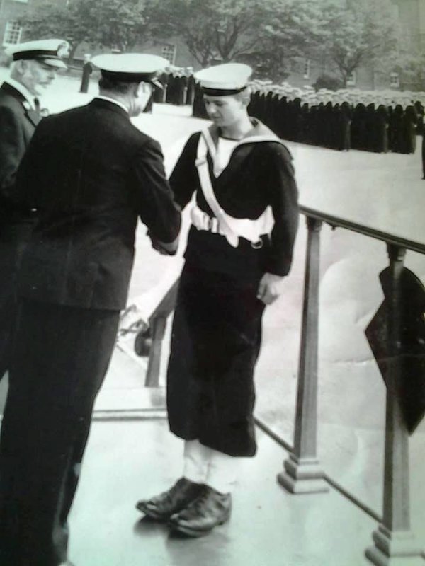1971 - GARY BLANKSBY, ACCEPTING PRINCIPLE DRUMMER'S SASH FROM CAPT. BUTTON..jpg