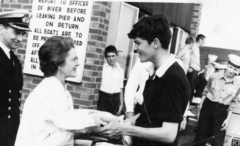 1971, 1ST NOVEMBER - PETER DAVID, PRESENTING MRS ASH, CO'S WIFE, WITH FLOWERS AFTER REGATTA..jpg