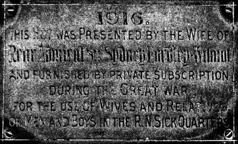 1916 - PLAQUE ON THE OUTSIDE OF THE PARENT'S HUT IN THE SICK QUARTERS.jpg