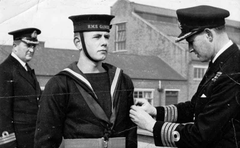 1949, JANUARY - DICK HALE, STAR OF THE FILM A SAILOR IS BORN, BEING RATED INSTRUCTOR BOY