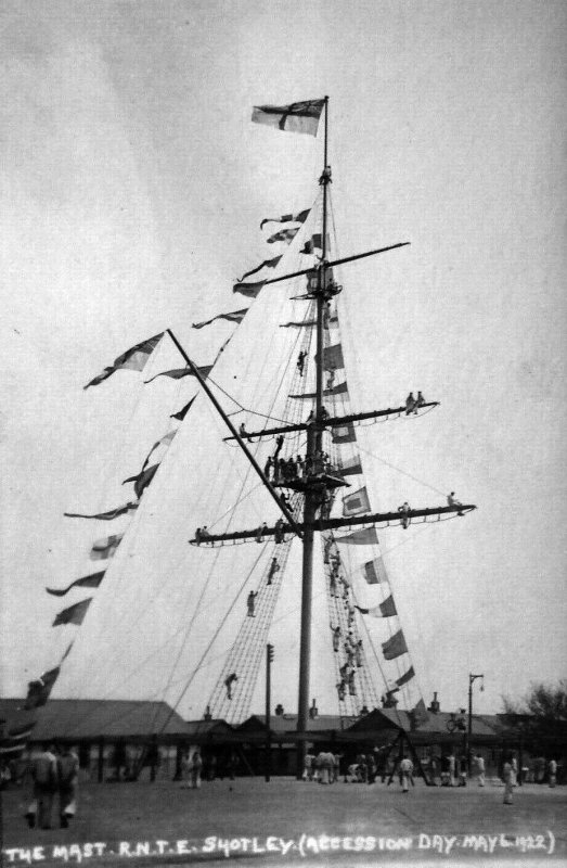 1922, 6TH MAY - MAST DRESSED OVERALL FOR ACCESSION DAY WITH BOYS ALOFT.