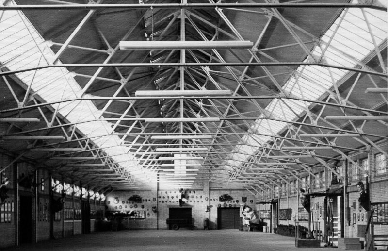 UNDATED - SHOWING THE INSIDE OF NELSON HALL, NOTE THE FIGURHEADS AND SHIPS BADGES.jpg