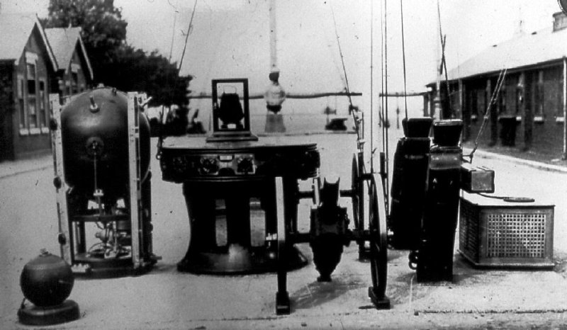 UNDATED - THE QUARTER DECK SHOWING SHIPs BITS, INCLUDING GERMAN BOMBS AND MINES, NOW IN THE R.N. MUSEUM PORTSMOUTH.JPG