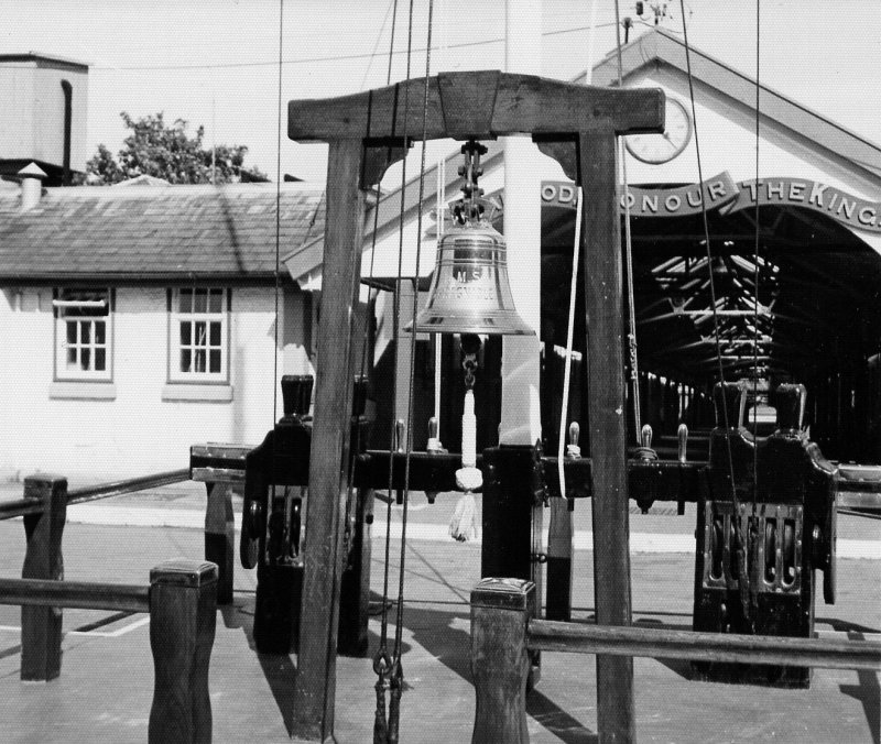 UNDATED - THE QUARTER DECK, SHOWING THE SHIP'S BELL FROM HMS IMPREGNABLE AND THE ENTRANCE TO THE LCW.jpg