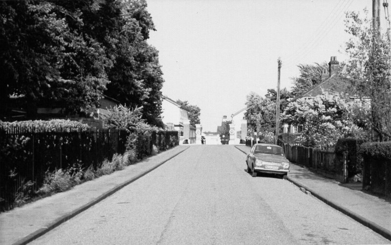 UNDATED - DICKIE DOYLE, CALEDONIA ROAD LEADING TO THE MAIN GATE, POST WW II.jpg
