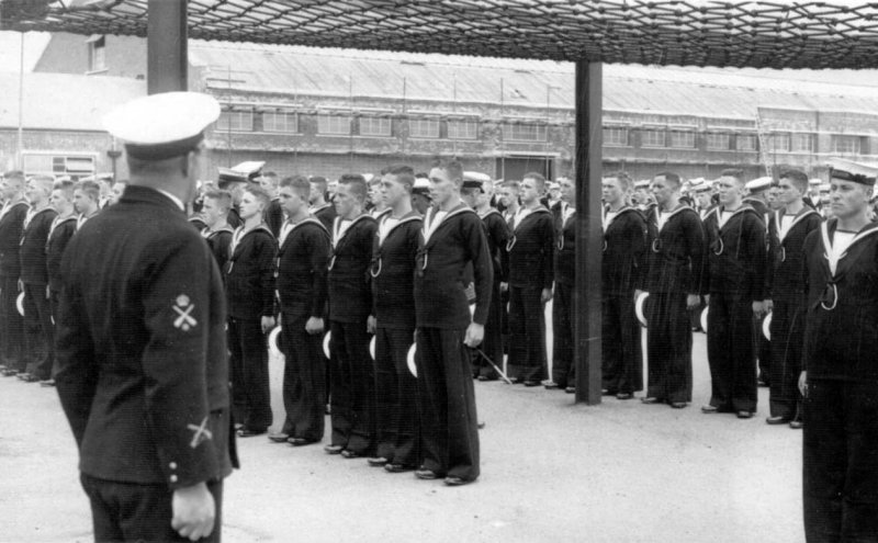UNDATED - PART OF A PARADE BEING INSPECTED WITH CAPS OFF.jpg