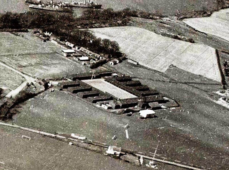 1940s - DICKIE DOYLE, POST WW II AERIAL VIEW OF THE ANNEXE, NOTE RESERVE FLEET SHIPS IN TOP OF THE PHOTO.jpg