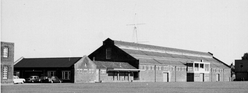 POST 1945 - DICKIE DOYLE, PARADE GROUND RIFLE STORE, PARADE GROUND OFFICE AND NELSON HALL VIEWED FROM THE PLAYING FIELD
